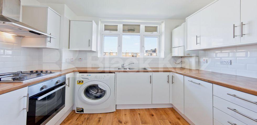 superbly located larger than average mid-century development   Stewarts Road , Battersea Park Station